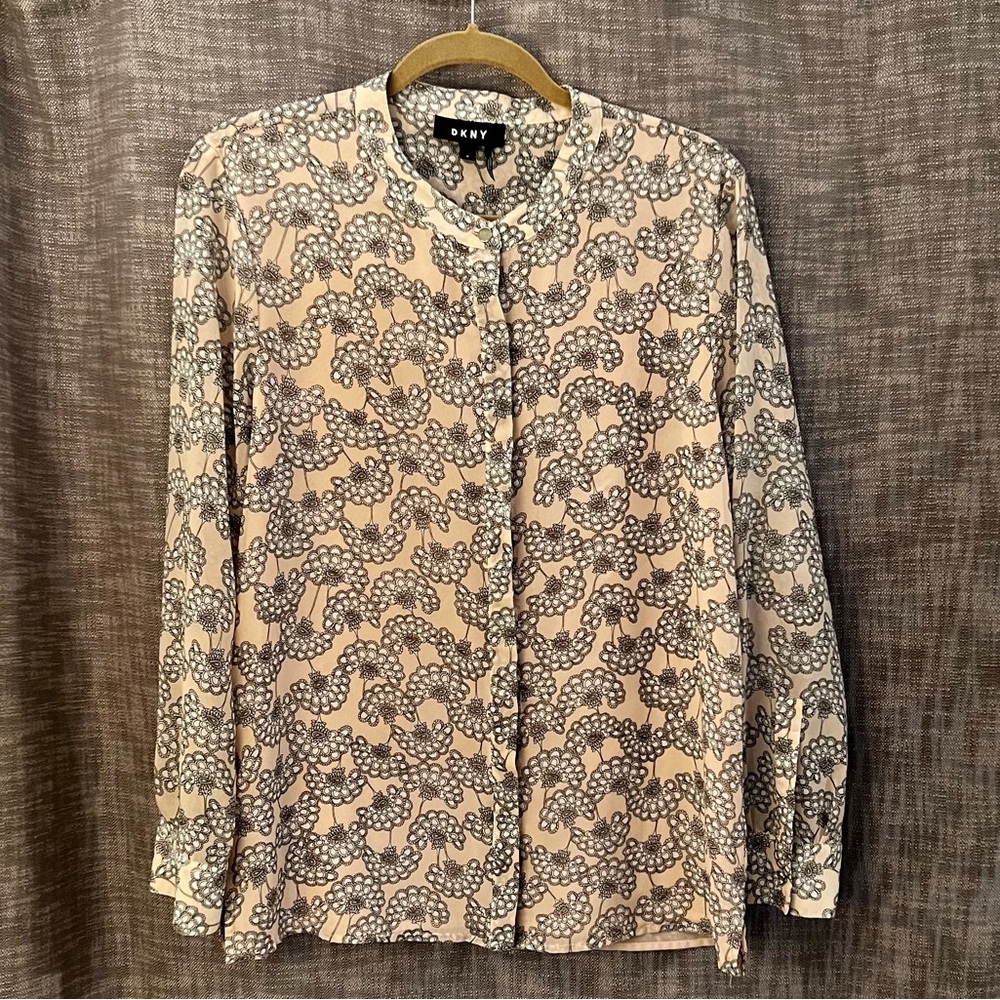 White paisley floral pattern on blush shirt. Brand: DKNY; Size: M. Slightly used